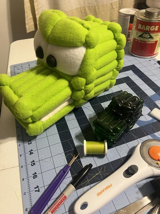 Puppet body piece in progress on the cutting mat
