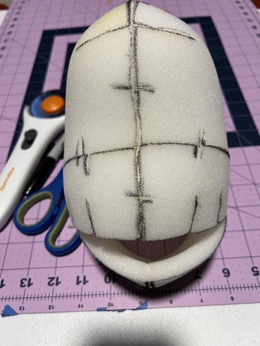 Puppet head foam base marked up for cutting